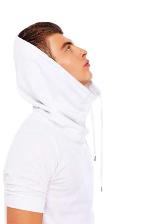 Photo of a handsome male model looking upwardsの写真素材