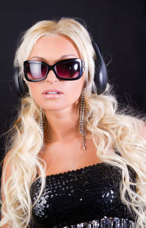 Blond lady in black sunglassesの写真素材