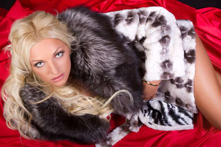 Female in white fur coatの写真素材