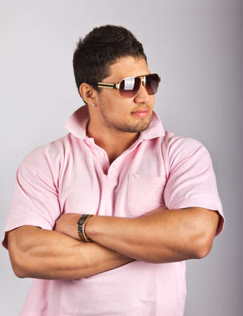 Portrait of stylished young man wearing sunglasses の写真素材