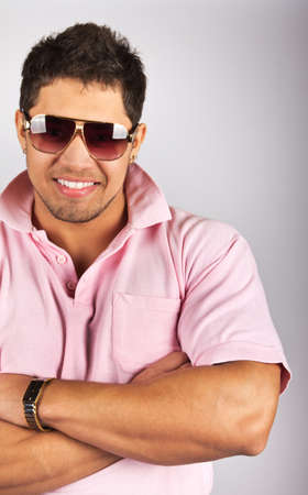 Portrait of stylished young man wearing sunglasses の写真素材