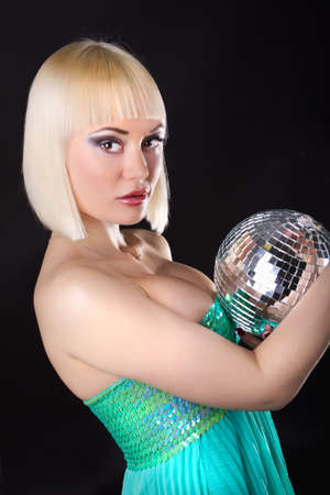 Female is holding a sphere の写真素材