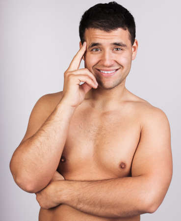 Studio portrait of a happy man の写真素材