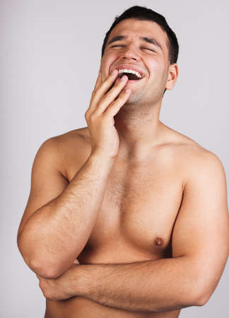 Studio portrait of a happy man の写真素材