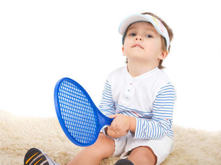 Young boy with tennis racket .isolated on whiteの写真素材
