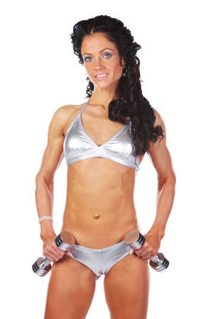 Image of sexy female posing with dumbells, isolated on whiteの写真素材
