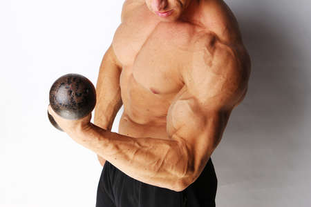 Image of sexy bodybuilder with dumbbellの写真素材