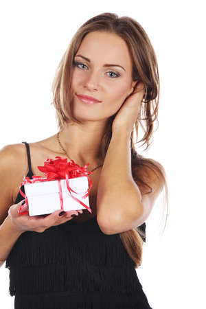 Image of brunette female holding christmas gift, isolated on whiteの写真素材