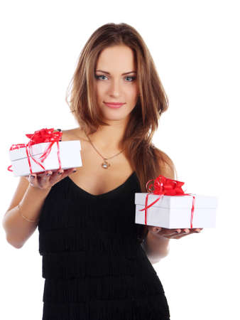 Image of happy brunette female holding christmas gift, isolated on whiteの写真素材