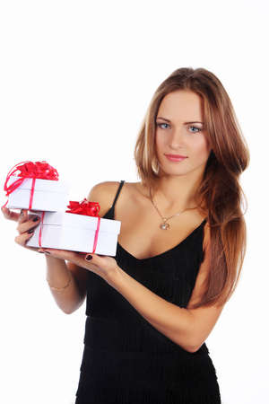 Image of brunette female holding christmas gift, isolated on whiteの写真素材