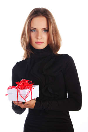 Image of brunette female holding christmas gift, isolated on whiteの写真素材