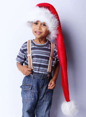 Profile of an adorable African American baby in a Santa Hatの写真素材