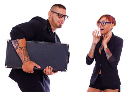 A couple tries to guess what's inside the boxの写真素材