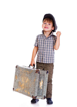 Portrait of handsome kid posing in studio with bagの写真素材