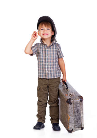 Portrait of handsome kid posing in studio with bagの写真素材