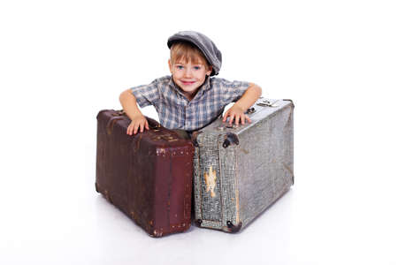 Portrait of handsome kid posing in studio with bagの写真素材