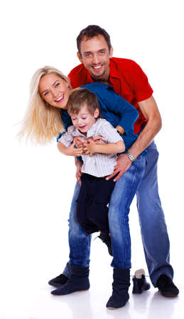 Portrait of lucky family posing in studioの写真素材