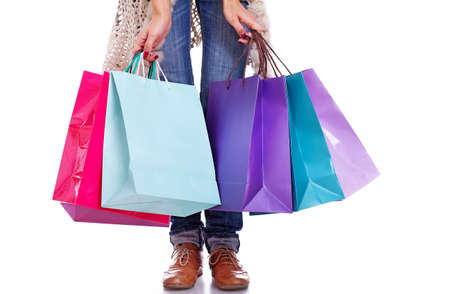 Portrait of young woman doing shopping in cityの写真素材