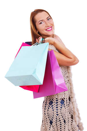 Portrait of young woman doing shopping in cityの写真素材