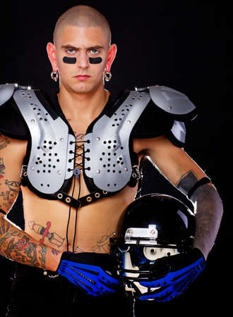 A football player wearing his protective gearの写真素材