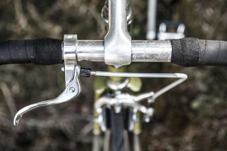 Handlebars of a scratched bike