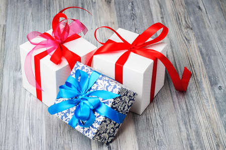 A blue box and two white ones