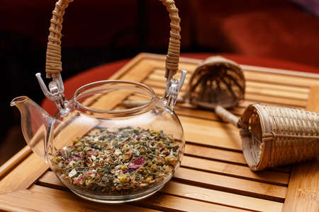 Transparent teapot and two organic tea strainersの写真素材
