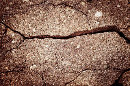 Picture of a cracked asphalt textureの写真素材