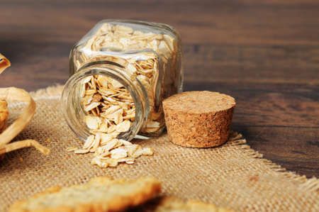 Jar with oats on a linen napkin
