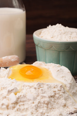 Egg white and yolk on flour
