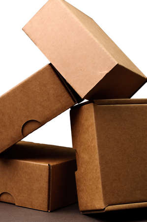 brown carton boxes on grey backgroundの写真素材