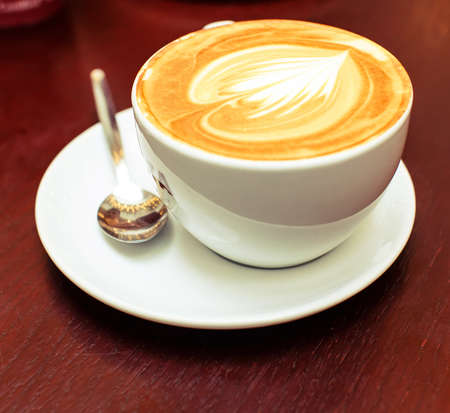 Image of coffee cup on the wooden tableの写真素材