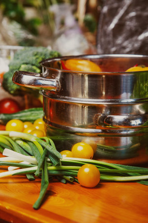 Image of vegetables on the table and in the stockpot