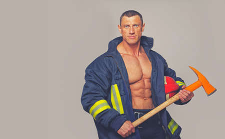 Portrait of fireman posing in studioの写真素材