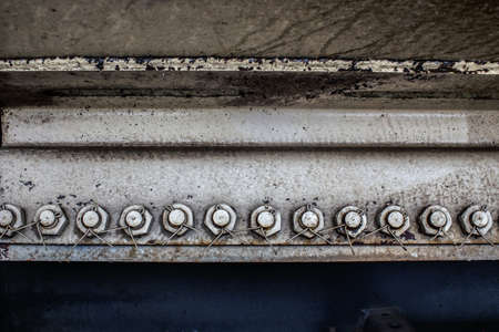Colorful and rusty background of railway carriage parts.の写真素材