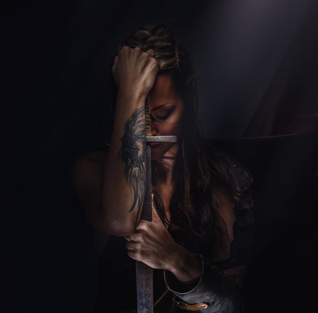 Beautiful female warrior elf with swordの写真素材