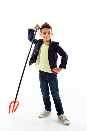 Boy with trident isolated on whiteの写真素材