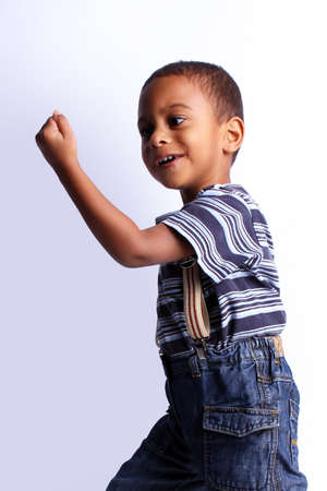 Happy black african child in studio.の写真素材