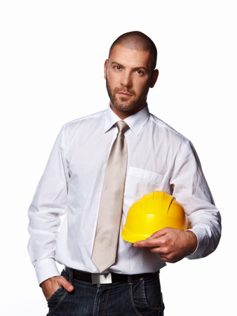 Male in a suit with hard hat isolated on white