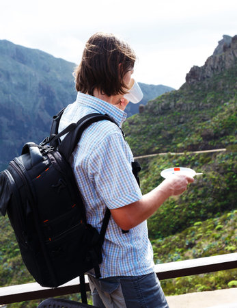 Guy on a trim in mountains.の写真素材