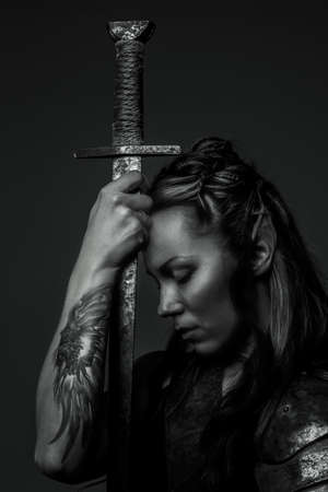 Elf woman with sword. Black and white photoの写真素材