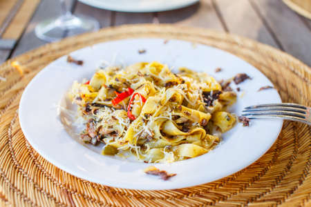 Pasta on white dishの写真素材