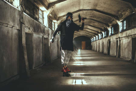 Bad male gangster in mask.の写真素材