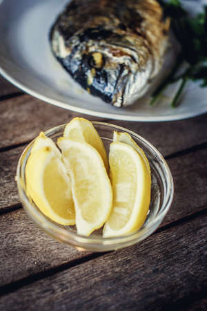 Pieces of lime in glass plate.の写真素材