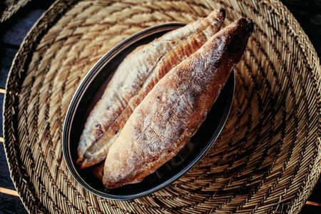 Two pieces of fresh brown bread.の写真素材