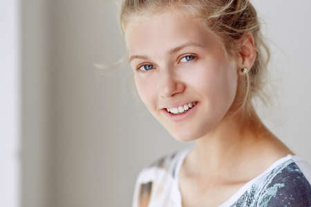 Soft portrait of smiling blond woman.の写真素材