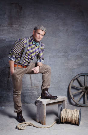 Fashionable guy in traveler clothes.