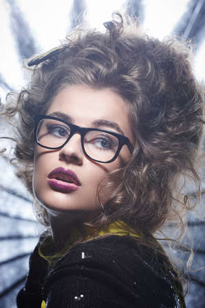 Artistic portrait of modern woman in sunglasses.の写真素材
