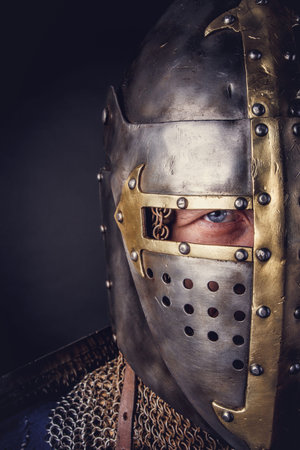 A man in a knight helmet.