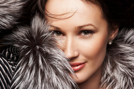 Portrait of stylish brunette woman.